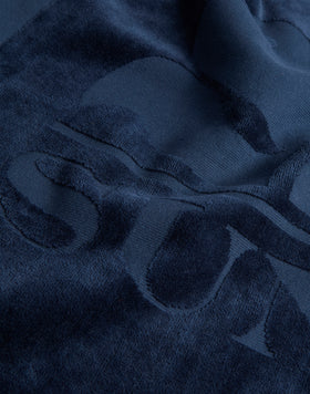 TISSU ÉPONGE JACQUARD AVEC LOGO ET BORDURE