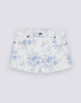 PANTALONES CORTOS DE NIÑA CON CORTES EN BRUTO EN ALGODÓN BULL CON ESTAMPADO ROSE DE JOIE