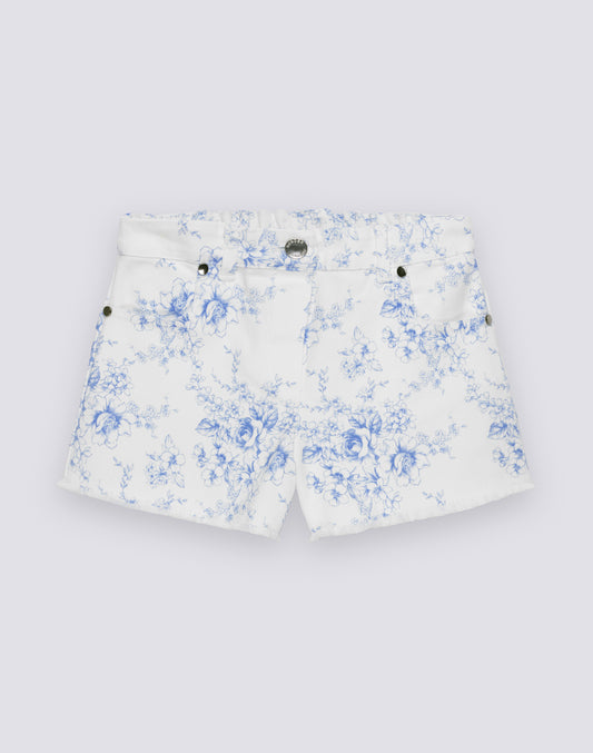 PANTALONES CORTOS DE NIÑA CON CORTES EN BRUTO EN ALGODÓN BULL CON ESTAMPADO ROSE DE JOIE